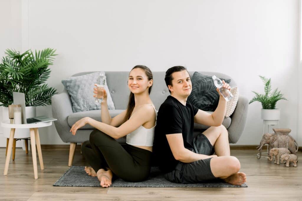 Young couple in yoga pose